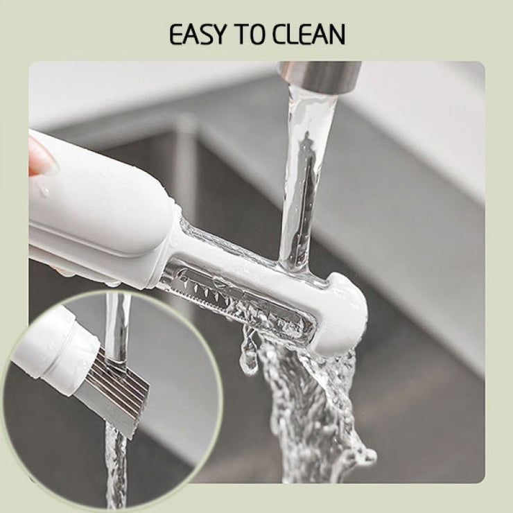 3-in-1 rotating stainless steel peeler being rinsed under water, easy to clean kitchen gadget.
