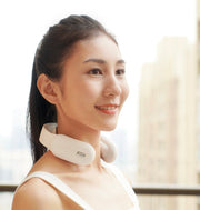 Cervical & Shoulder Massager on woman’s neck, white color, sleek design, remote control use.