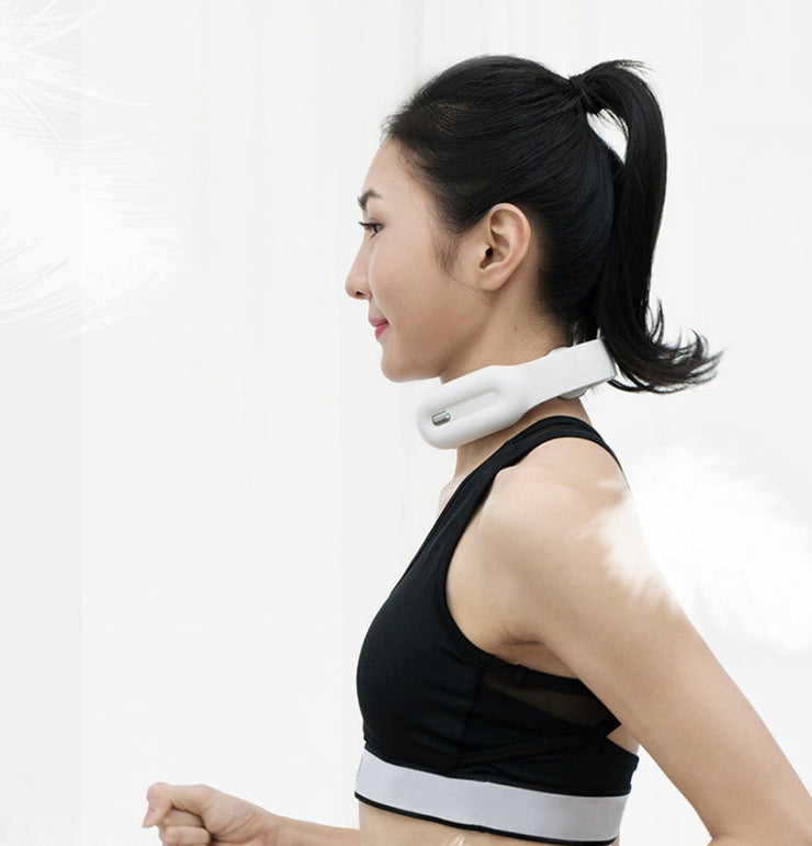 Cervical and shoulder massager in use, featuring ergonomic design.