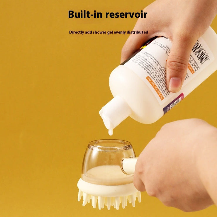 Silicone pet massage brush with built-in reservoir being filled with shower gel.