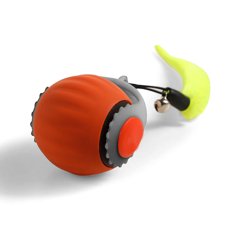 Pet gravity ball cat toy with orange silicone design and tail attachment, for funny cat play.