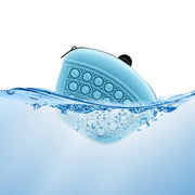 Silicone dog treat pouch submerged in water, showcasing its waterproof and washable features.
