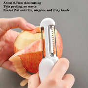 3-in-1 rotating stainless steel peeler in use on an apple, demonstrating precision thin peeling.