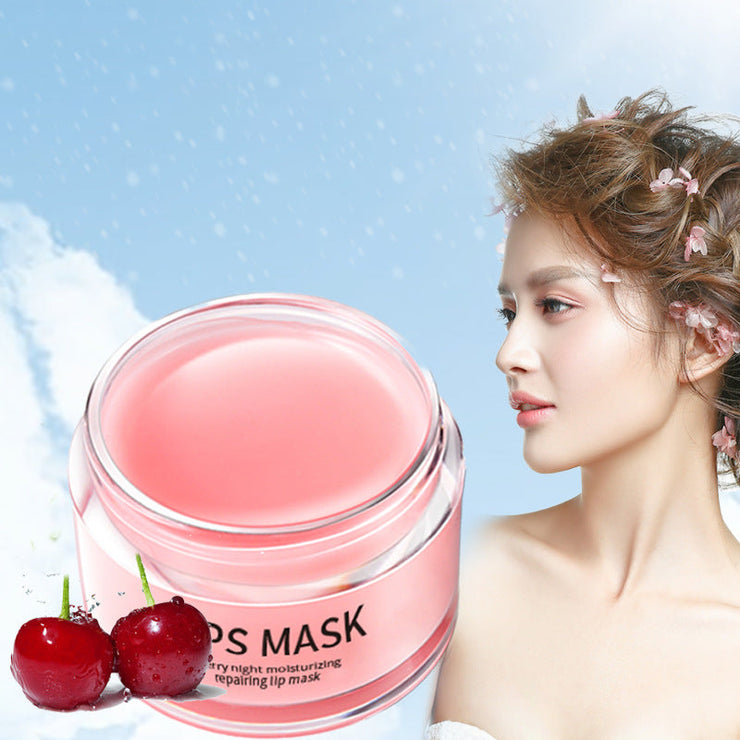 Moisturizing lip skin care product in a stylish jar with cherries, providing hydration and shine.