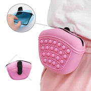 Portable silicone dog treat pouch with waist clip, featuring an anti-slip bubble design for easy outdoor pet training.