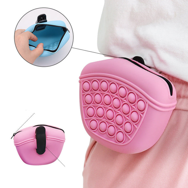 Portable silicone dog treat pouch with waist clip, featuring an anti-slip bubble design for easy outdoor pet training.