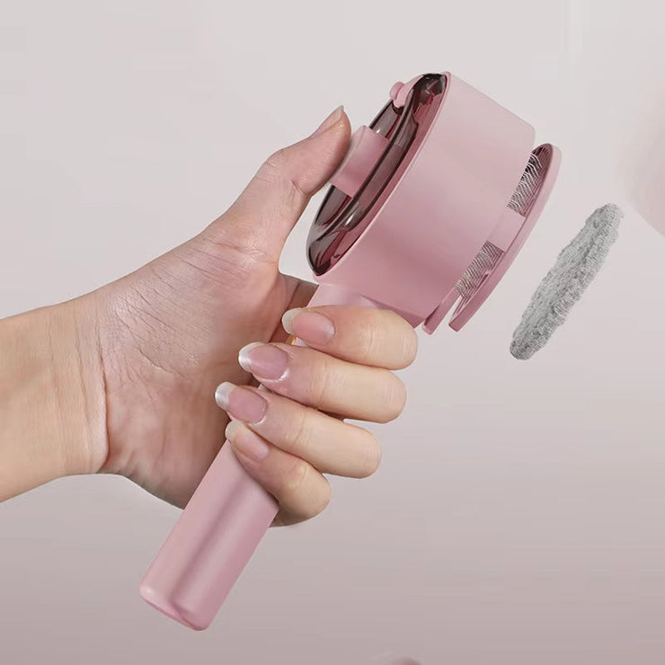 Cat Dog Steamy Brush for pet grooming and massage, pink handheld electric sprayer.