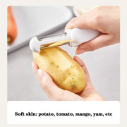 3-in-1 rotating stainless steel peeler used on potato.