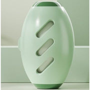 Green, ergonomic lint roller with ultra-sticky sheets for removing hair and lint from fabrics.
