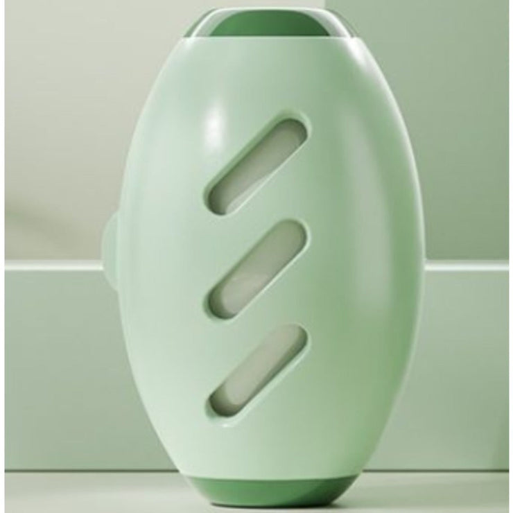 Green, ergonomic lint roller with ultra-sticky sheets for removing hair and lint from fabrics.