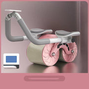 Abdominal wheel with automatic rebound and elbow support in pink and gray, ideal for fitness and belly slimming.