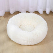 Ultra-soft dog bed with plush cushioning for comfort on hardwood floor.