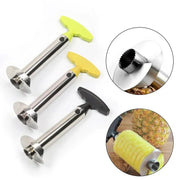 Stainless steel pineapple slicer peeler with ergonomic handle and circular blade, shown with peeled pineapple.