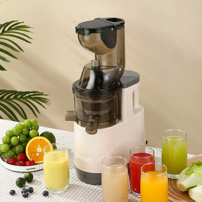 Houselin 7 inch cold press juicer with fresh juice and fruits on table.