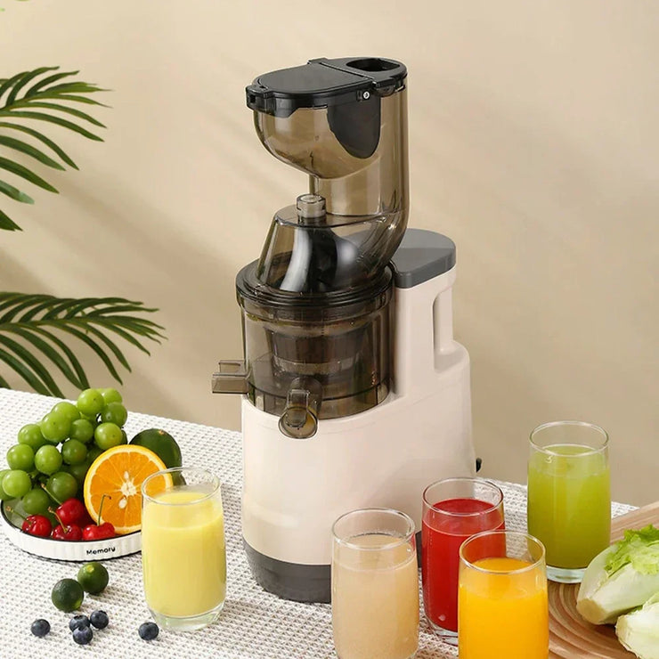 Houselin 7 inch cold press juicer with fresh juice and fruits on table.