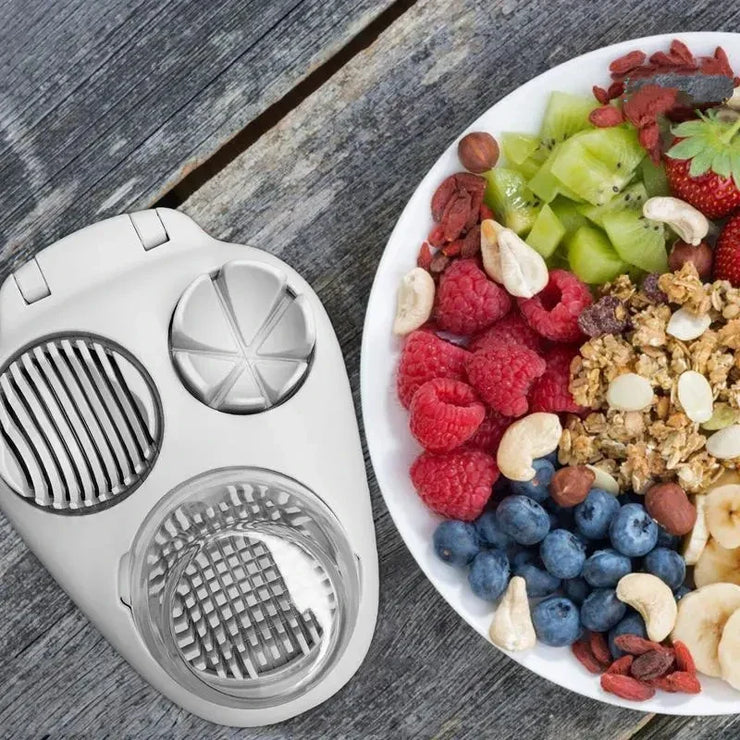 3in1 creative egg slicer and vegetable slicer on wooden table next to fruit and nuts.