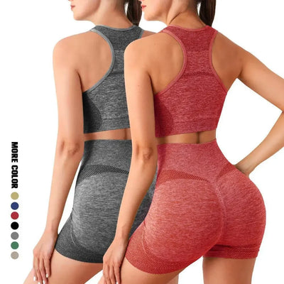 Women in seamless yoga set featuring gym shorts and sports bras in gray and red.