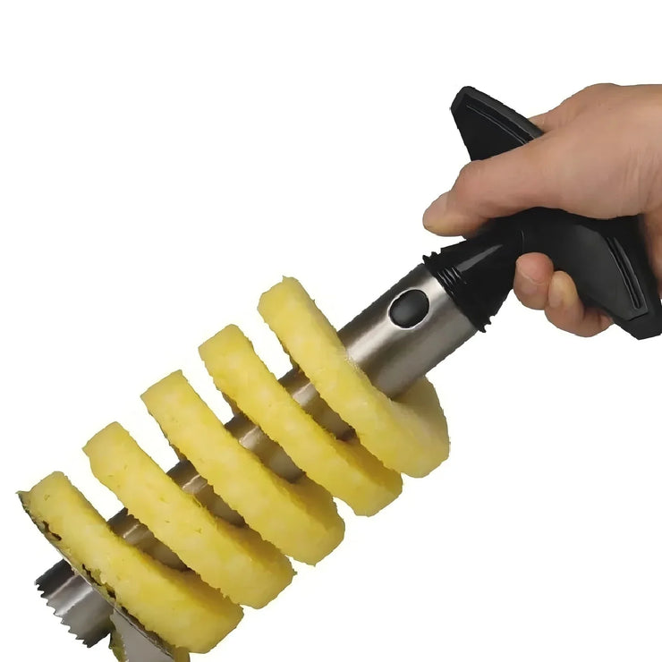 Stainless steel pineapple slicer peeling multiple pineapple rings.