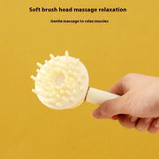 Silicone massage brush for pets in beige, designed for gentle muscle relaxation.