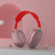 P9 Air Max Wireless Stereo Headphone in pink with a sleek, modern design on a pink background.